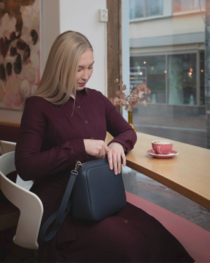 utua kajo käsilaukku kuvavideo
